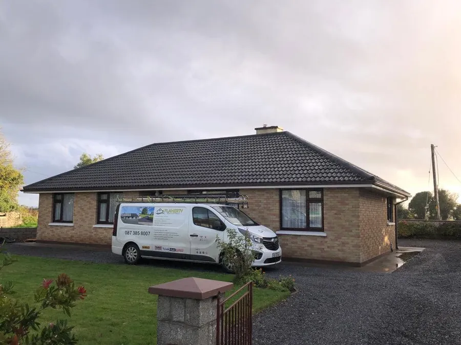 Bungalow with the Flaherty van outside during a re-roof, Flaherty Roof and Driveways