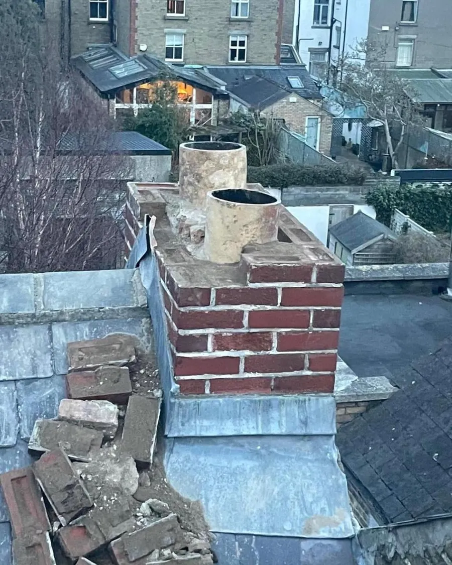 Brick chimney with lead flashing on a slate roof, Flaherty Roof and Driveways