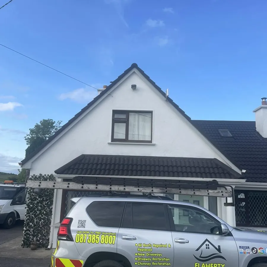 Re-coloured dormer bungalow roof with the Flaherty 4x4 on the drive, Flaherty Roof and Driveways