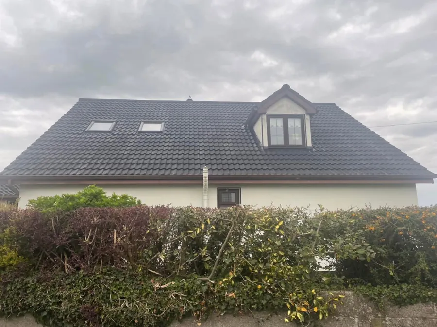 Dormer bungalow with its tiled roof cleaned and re-coloured, Flaherty Roof and Driveways
