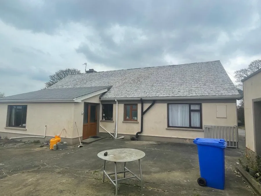 Bungalow roof before cleaning, grey and weathered, Flaherty Roof and Driveways