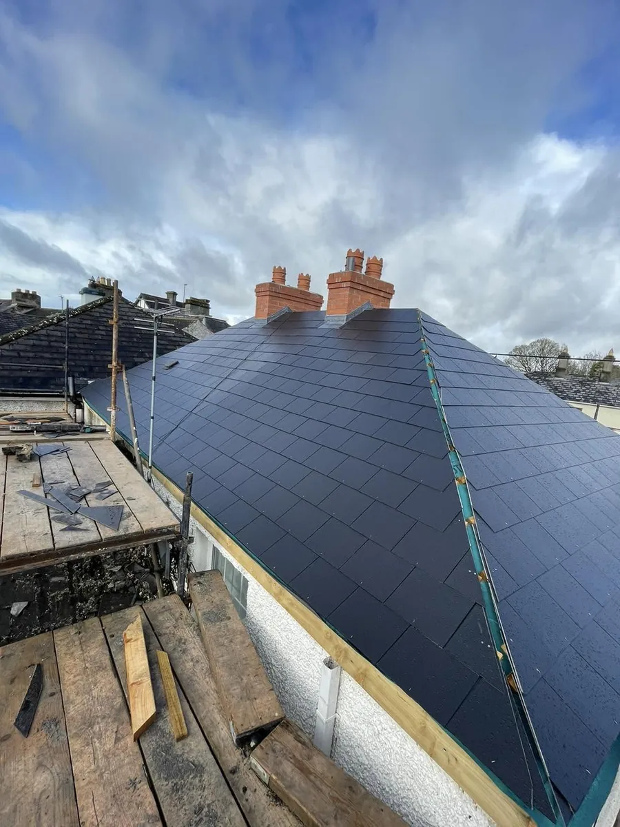 Finished slate roof on a hipped house, Flaherty Roof and Driveways
