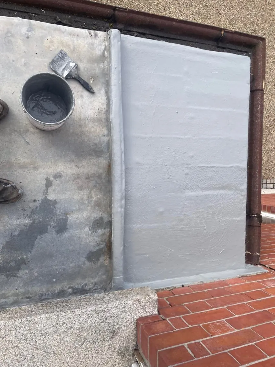 Flat roof re-coated around the outlet, Flaherty Roof and Driveways