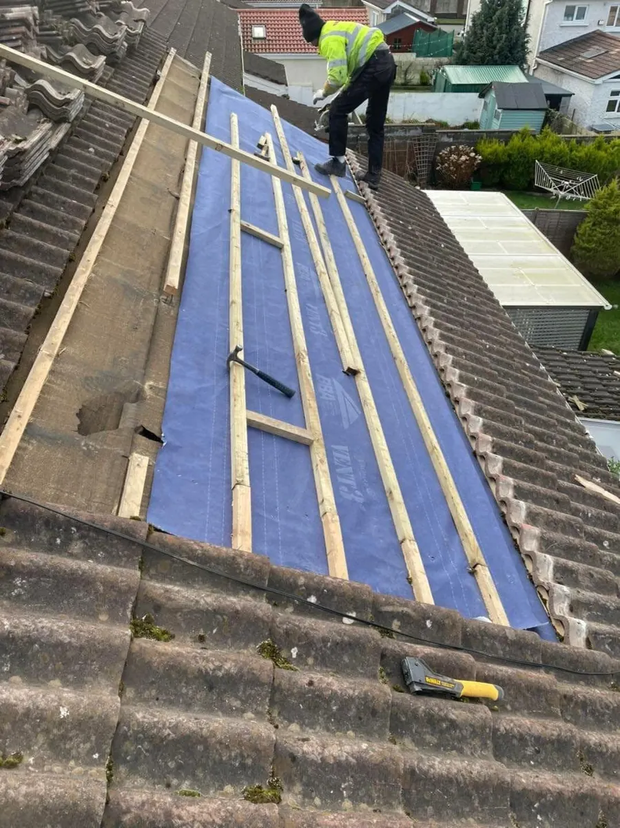 New battens over breathable membrane on a tile re-roof, Flaherty Roof and Driveways