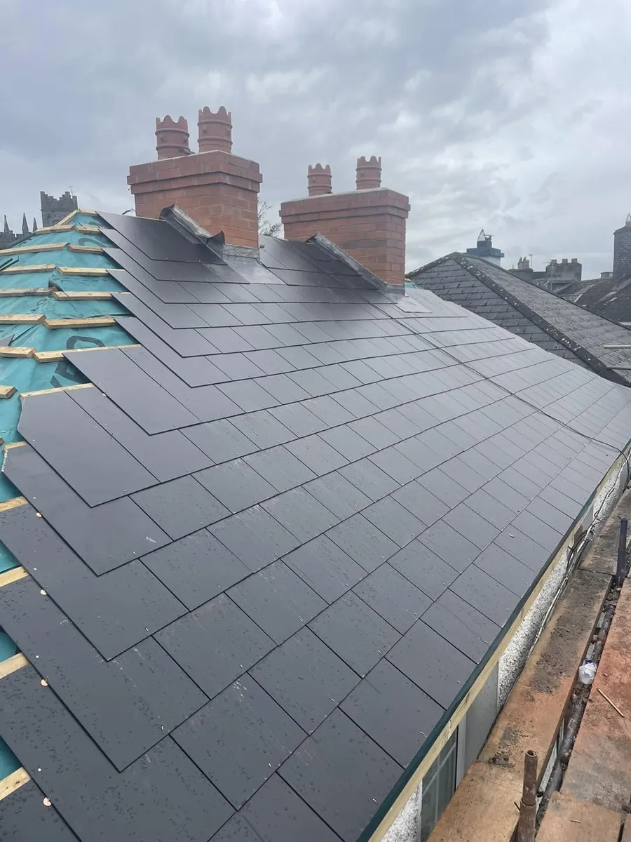 New slate roof with a rebuilt chimney and new pots, Flaherty Roof and Driveways