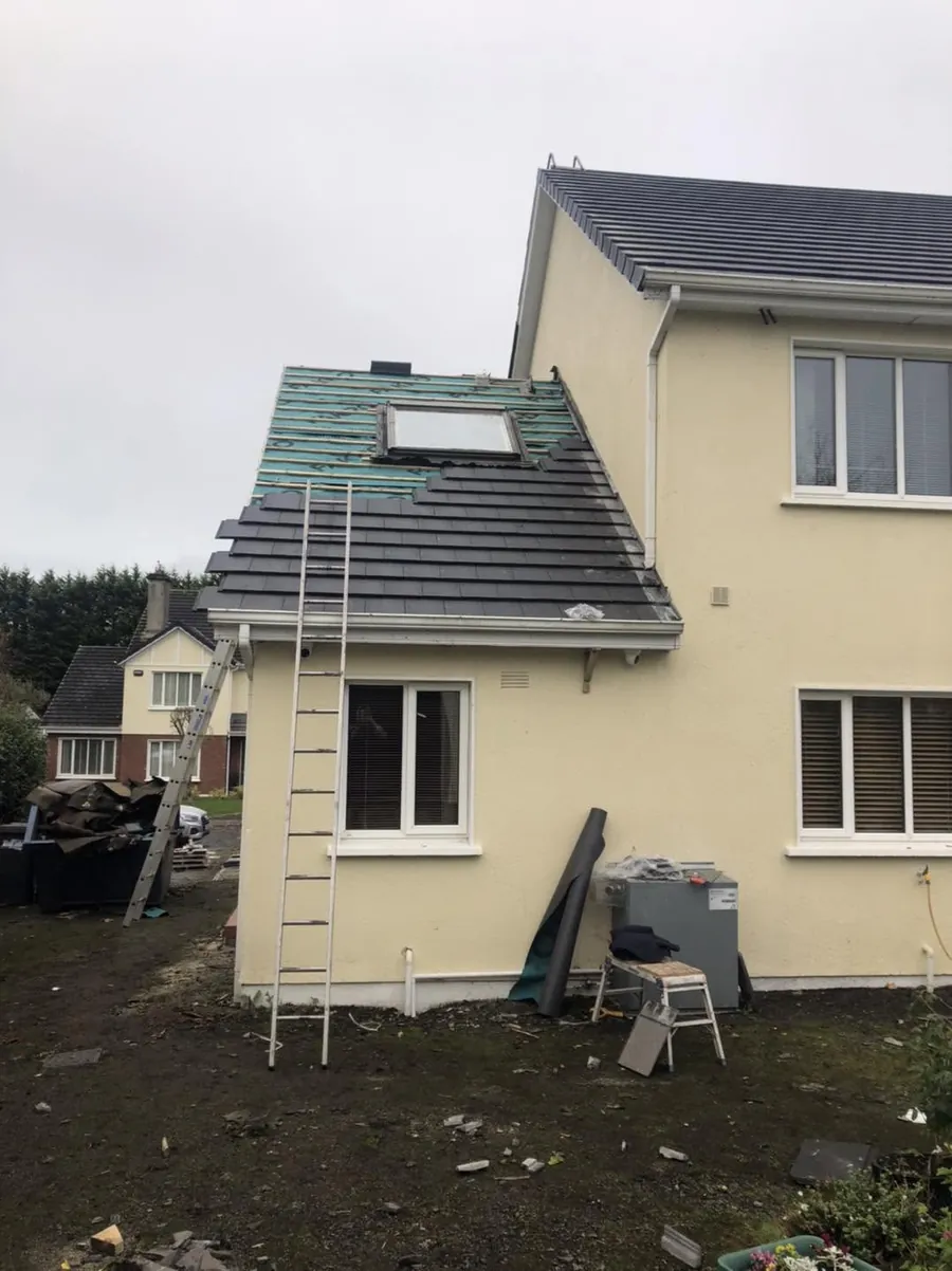Semi-detached house half way through a re-roof, Flaherty Roof and Driveways