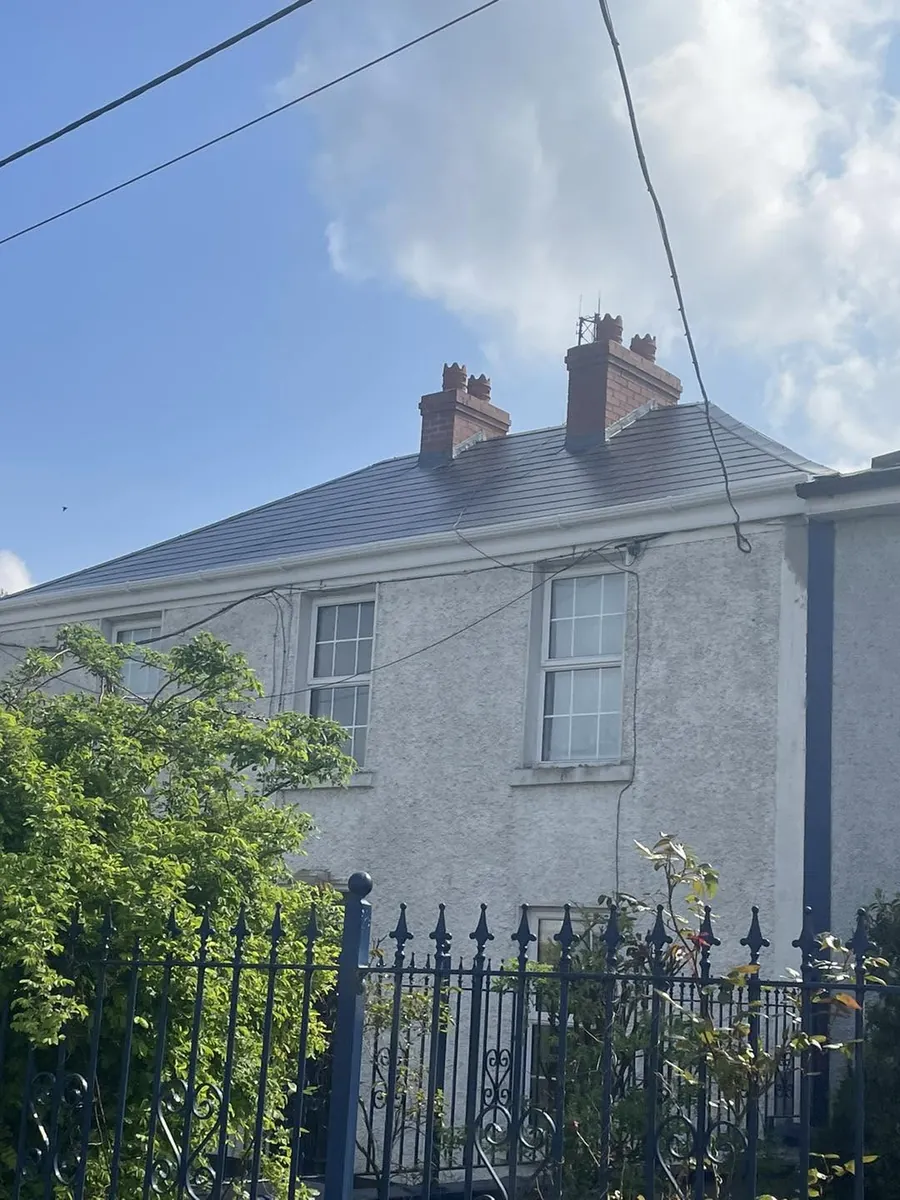 Two-storey rendered house with its new slate roof, Flaherty Roof and Driveways