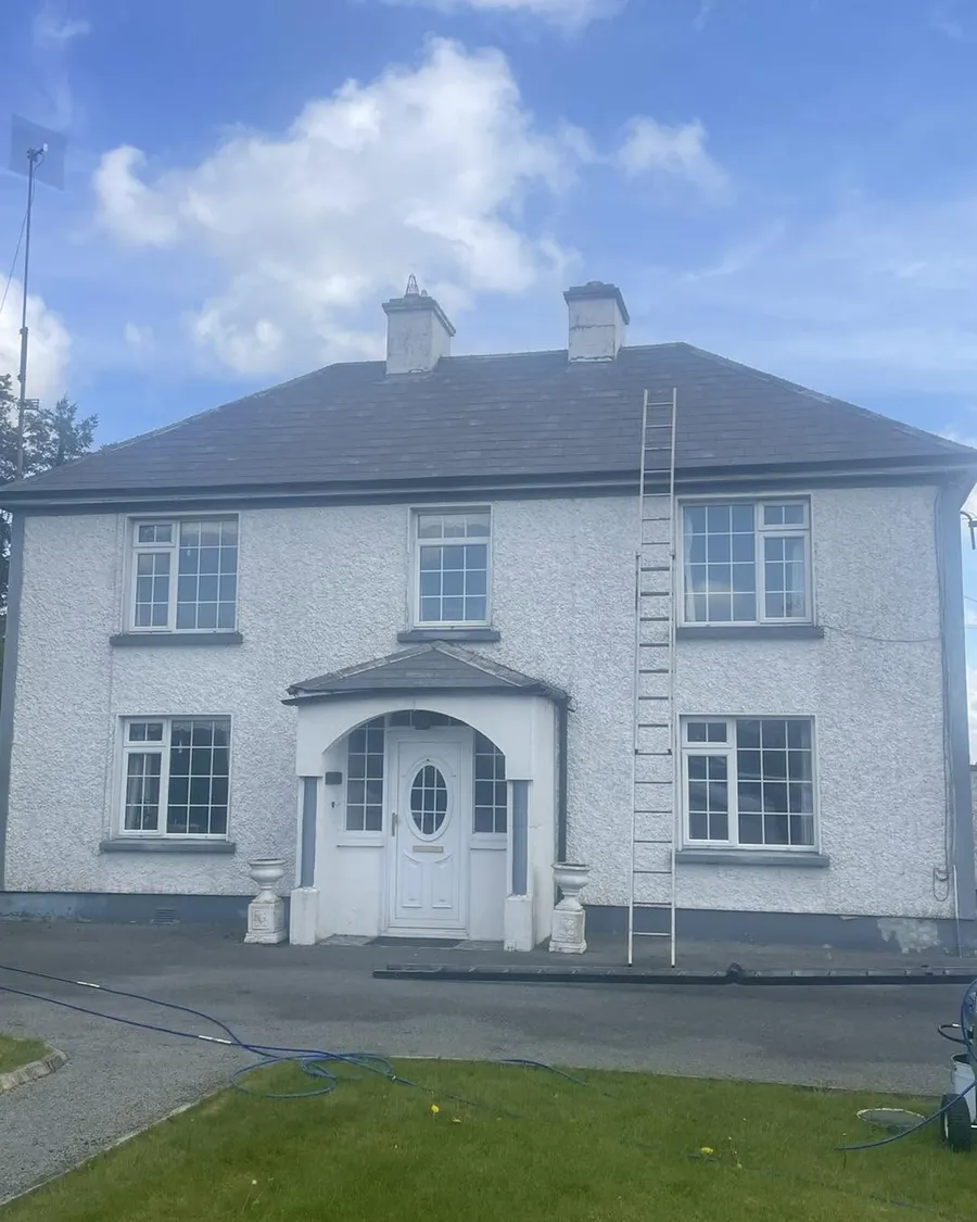 Two-storey house roof before cleaning, Flaherty Roof and Driveways
